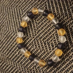 This bracelet is limited edition.it's orange and black and white